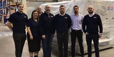 staff at MAG Laundry Equipment with primer es